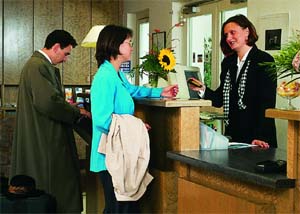 Ursula Wagner and Frau Schulz at the reception desk at the Hotel Ambiente